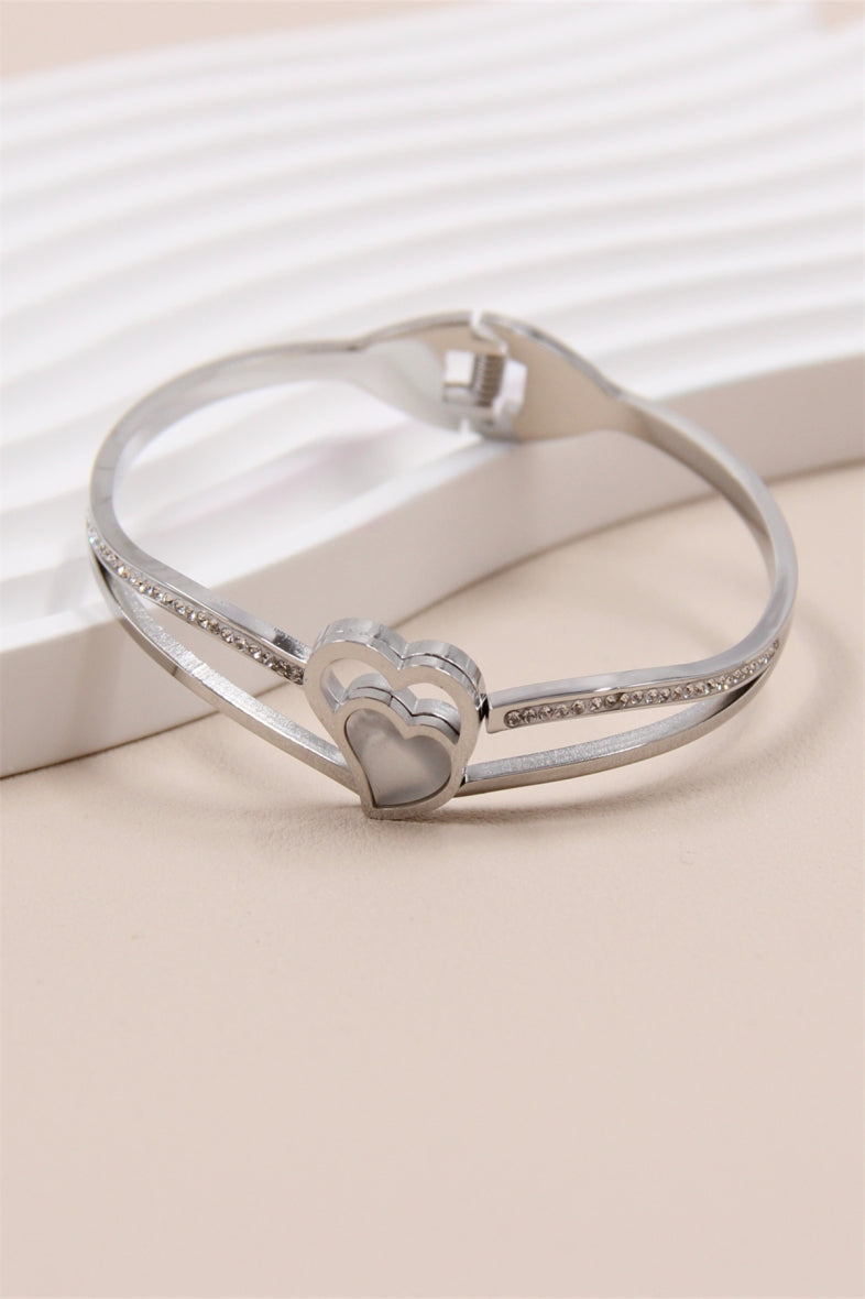 Bangle/armband met steentjes en parelmoeren hart